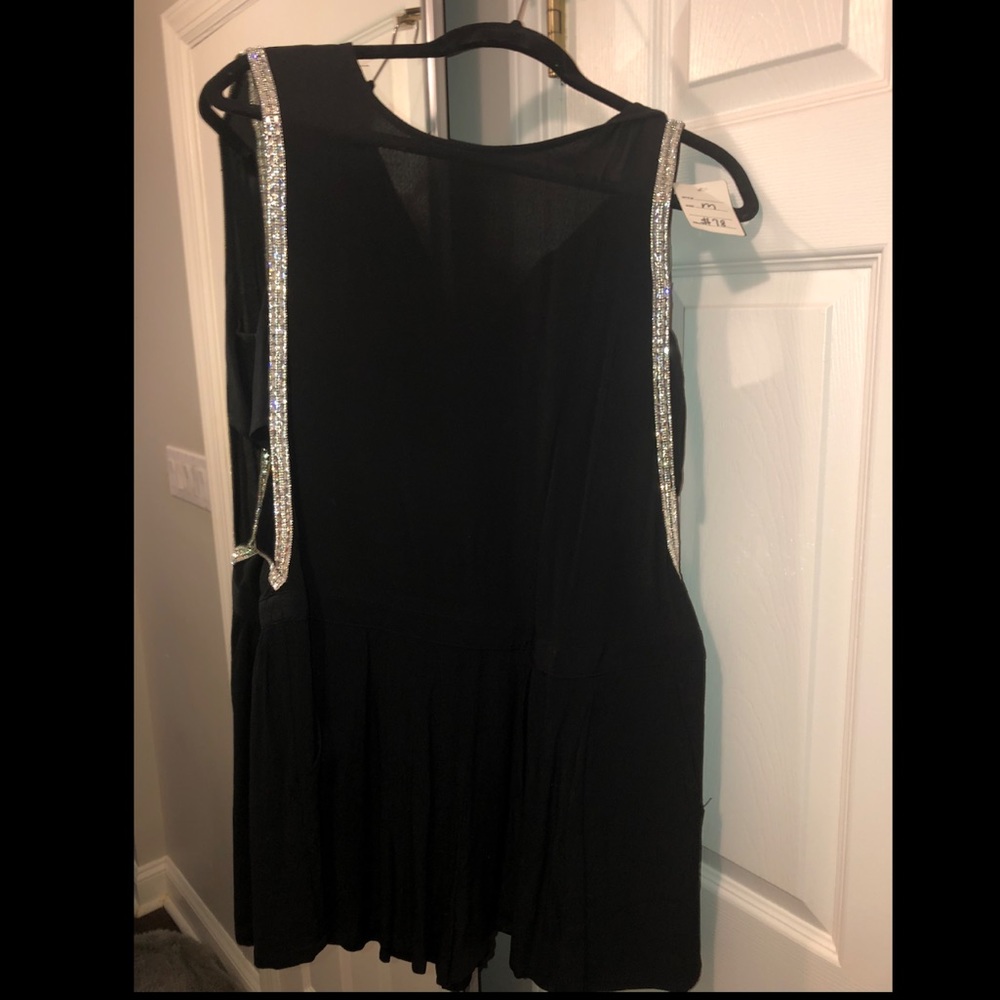 Black romper size Medium . Brand new